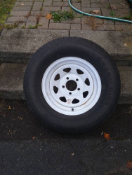 trailer tire + rim - $75 (DANBURY)